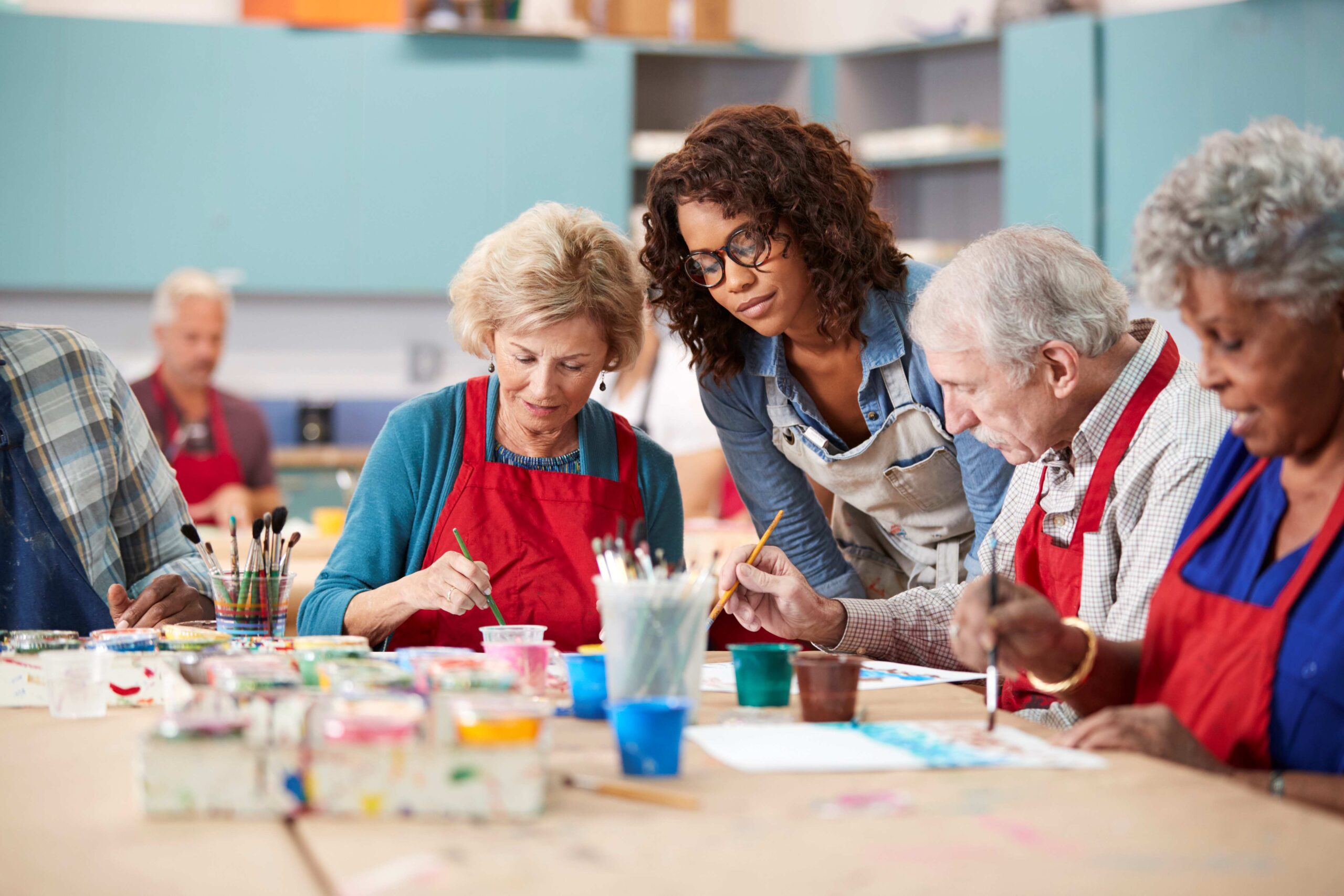 group of retired seniors attending an art class